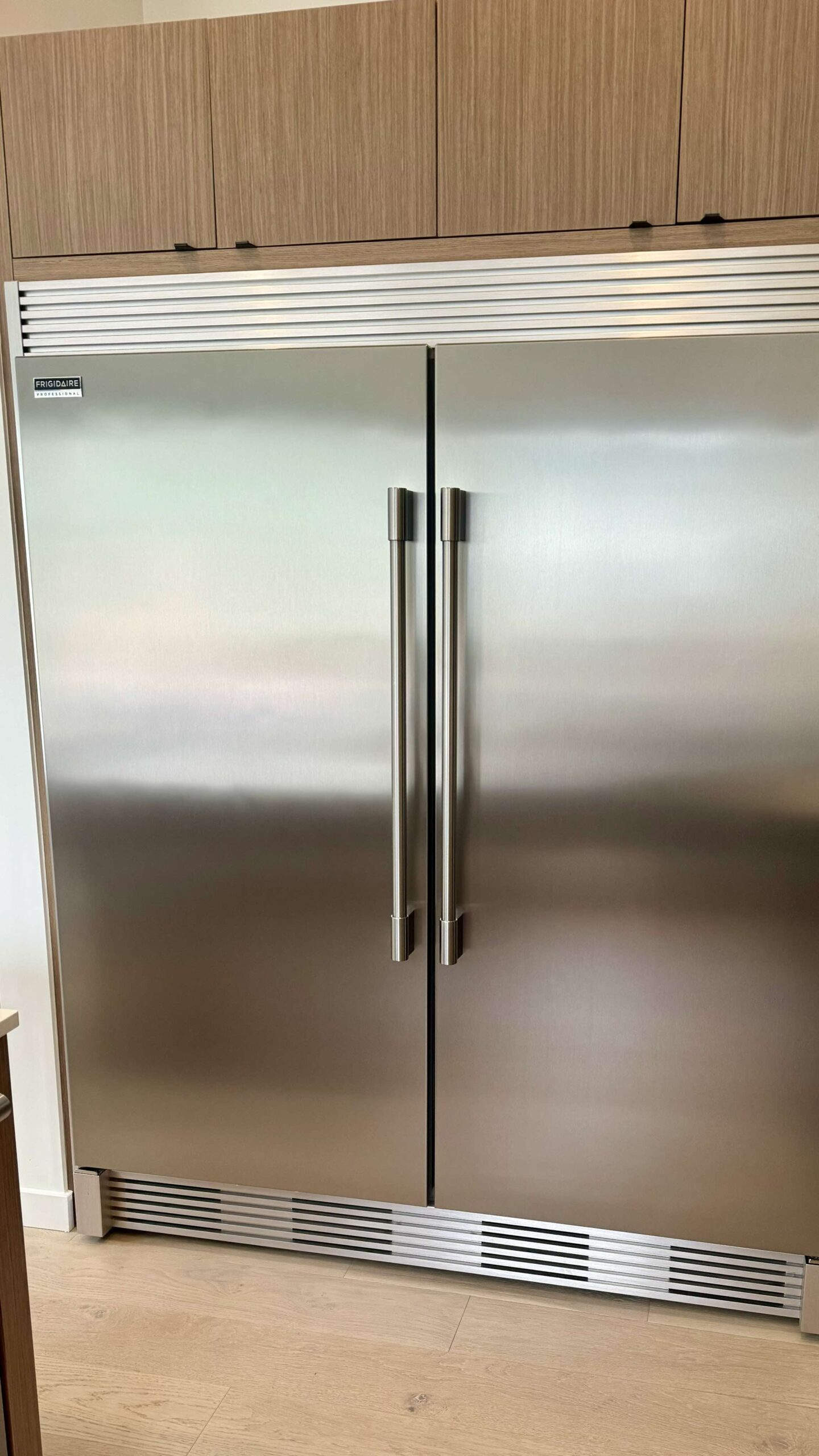 Airbnb turnover — stainless steel fridge polished