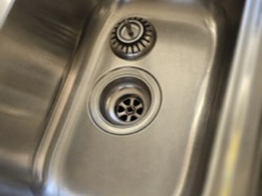 Kitchen sink after — Art of CleaNest Edmonton