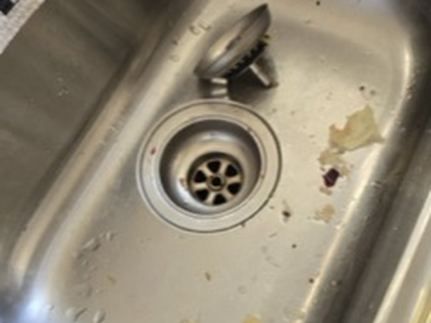 Kitchen sink before — Art of CleaNest Edmonton